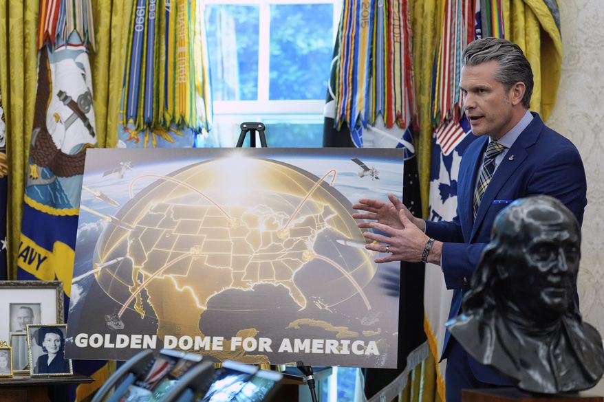 Defense Secretary Pete Hegseth speaks during an event with President Donald Trump in the Oval Office of the White House, Tuesday, May 20, 2025, in Washington. (AP Photo/Alex Brandon)