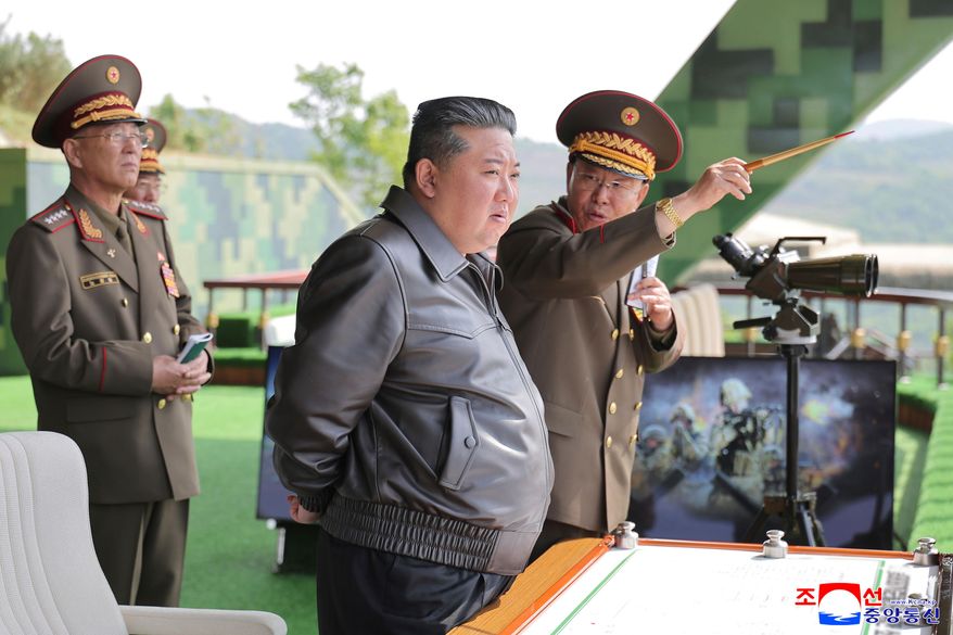 In this photo provided by the North Korean government, North Korean leader Kim Jong-un, center, inspects the military exercises at an undisclosed place in North Korea, Tuesday, May 13, 2025. Independent journalists were not given access to cover the event depicted in this image distributed by the North Korean government. The content of this image is as provided and cannot be independently verified. Korean language watermark on image as provided by source reads: "KCNA" which is the abbreviation for Korean Central News Agency. (Korean Central News Agency/Korea News Service via AP) **FILE**
