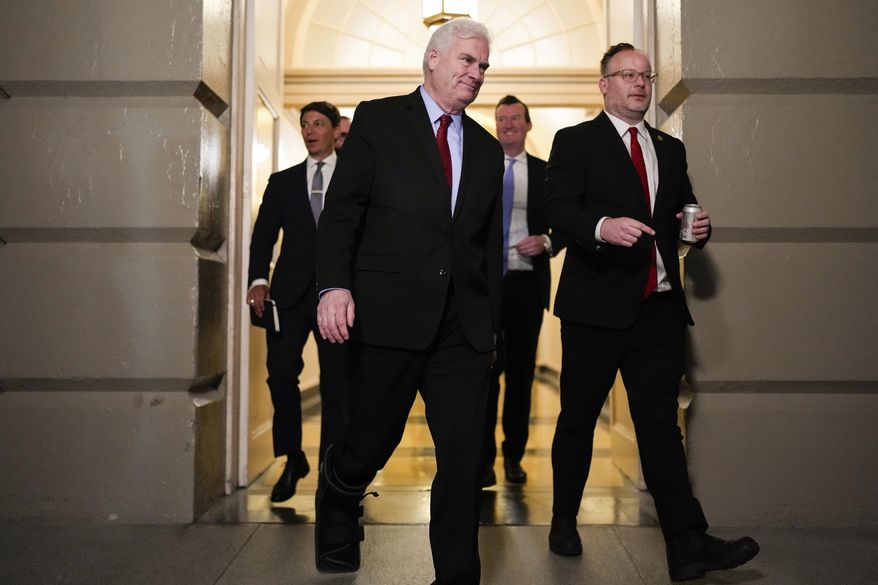 House Majority Whip Tom Emmer, R-Minn., center, arrives for a House Republican conference meeting, Tuesday, May 20, 2025, at the U.S. Capitol in Washington. (AP Photo/Julia Demaree Nikhinson)