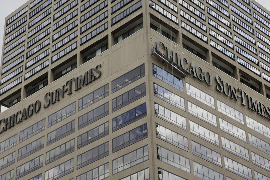The building housing the Chicago Sun Times is seen Monday, June 19, 2017, in Chicago. (AP Photo/G-Jun Yam, File)