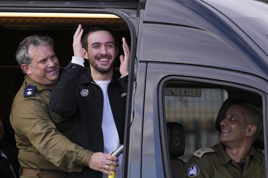 Freed Israeli hostage Omer Shem Tov looks on from a van as he arrives at Beilinson hospital in Petah Tikva, Israel, after he was released from Hamas captivity in the Gaza Strip, Feb. 22, 2025. (AP Photo/Ariel Schalit) **FILE**