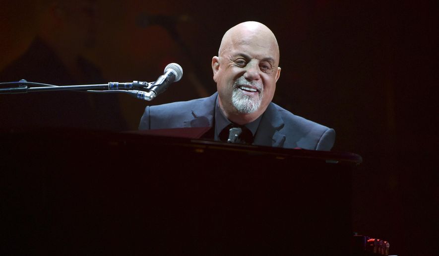 Musician Billy Joel performs during his 100th lifetime performance at Madison Square Garden in New York on Wednesday, July 18, 2018. (Photo by Evan Agostini/Invision/AP)