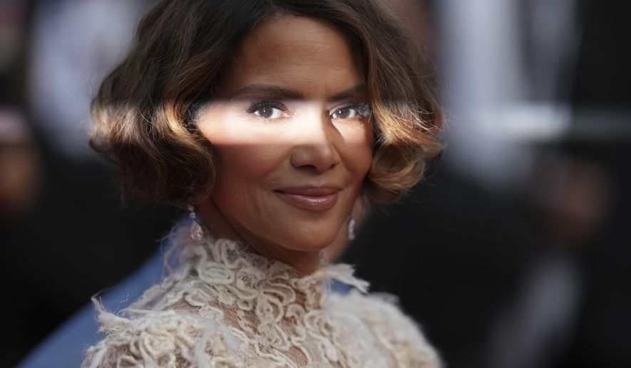 Jury member Halle Berry poses for photographers during the awards ceremony red carpet at the 78th international film festival, Cannes, southern France, Saturday, May 24, 2025. (AP Photo/Natacha Pisarenko)