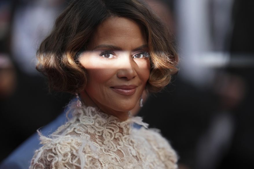 Jury member Halle Berry poses for photographers during the awards ceremony red carpet at the 78th international film festival, Cannes, southern France, Saturday, May 24, 2025. (AP Photo/Natacha Pisarenko)