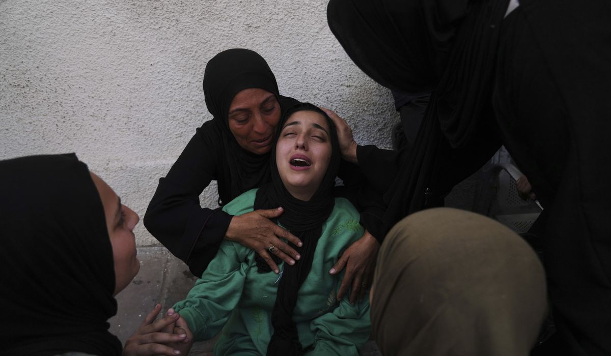 NextImg:Israeli strikes kill 52 in Gaza including 36 in a school-turned-shelter, medics say
