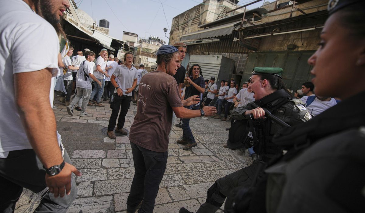 NextImg:Chanting ‘Death to Arabs,’ Israeli nationalists begin an annual march in Jerusalem