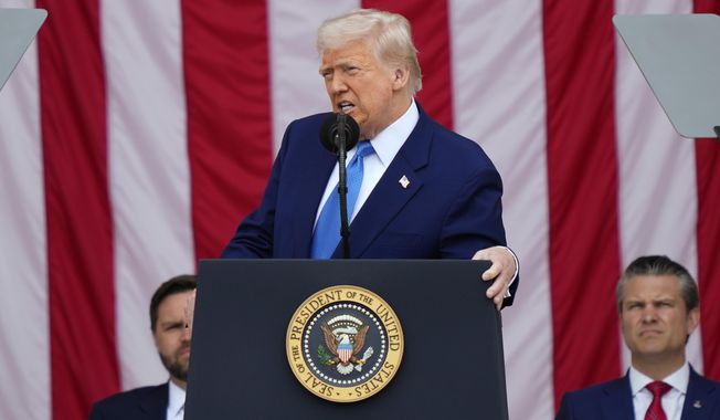 President Donald Trump delivers the Memorial Day Address at the 157th National Memorial Day Observance at Arlington National Cemetery, Monday, May 26, 2025, in Arlington, Va., as Vice President JD Vance and Secretary of Defense Pete Hegseth, right, look on. (AP Photo/Julia Demaree Nikhinson)