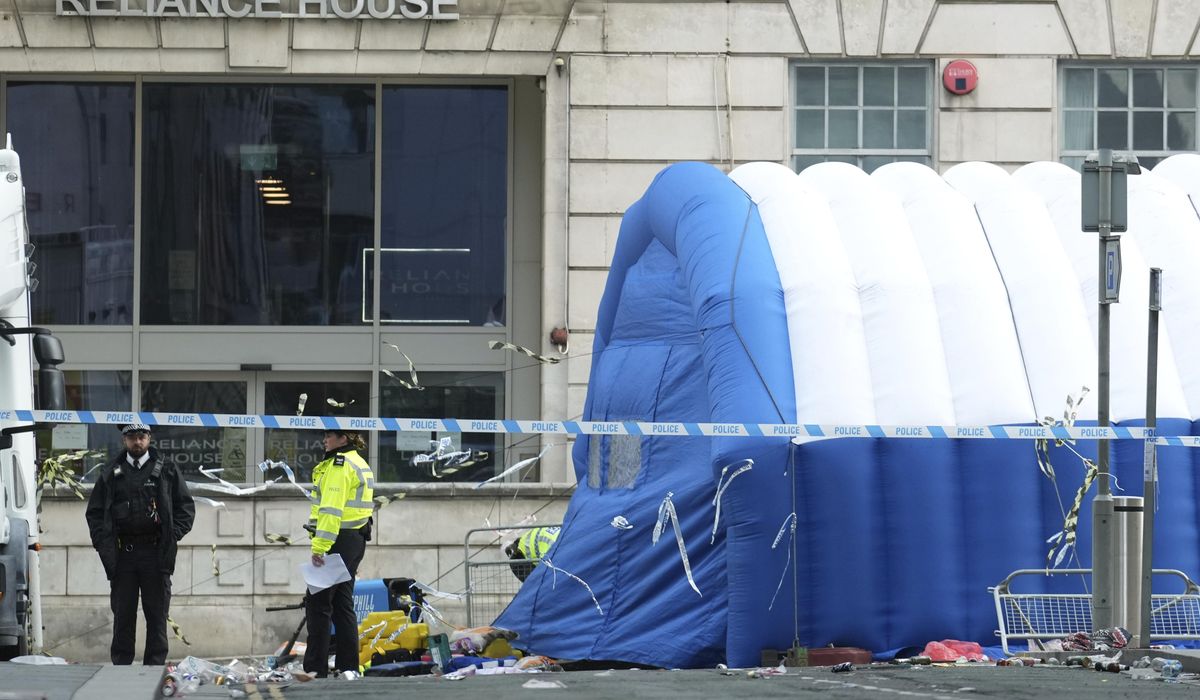 NextImg:4 Liverpool fans seriously hurt when car plowed into a crowd. The suspect acted alone, police say