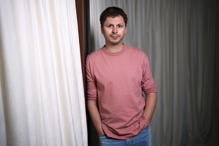 Michael Cera, from the film 'The Phoenician Scheme' poses during the 78th international film festival, Cannes, southern France on Sunday, May 18, 2025. (Photo by Scott A Garfitt/Invision/AP)