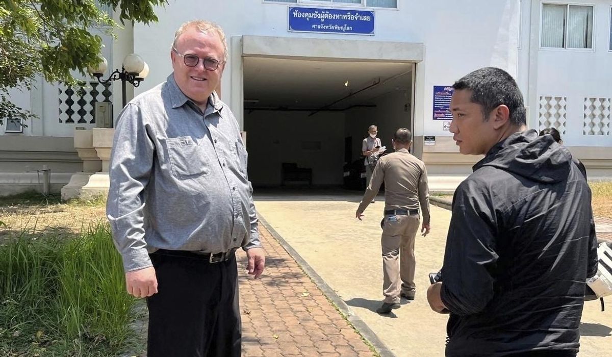 NextImg:U.S. scholar leaves Thailand after charges of insulting monarchy are dropped