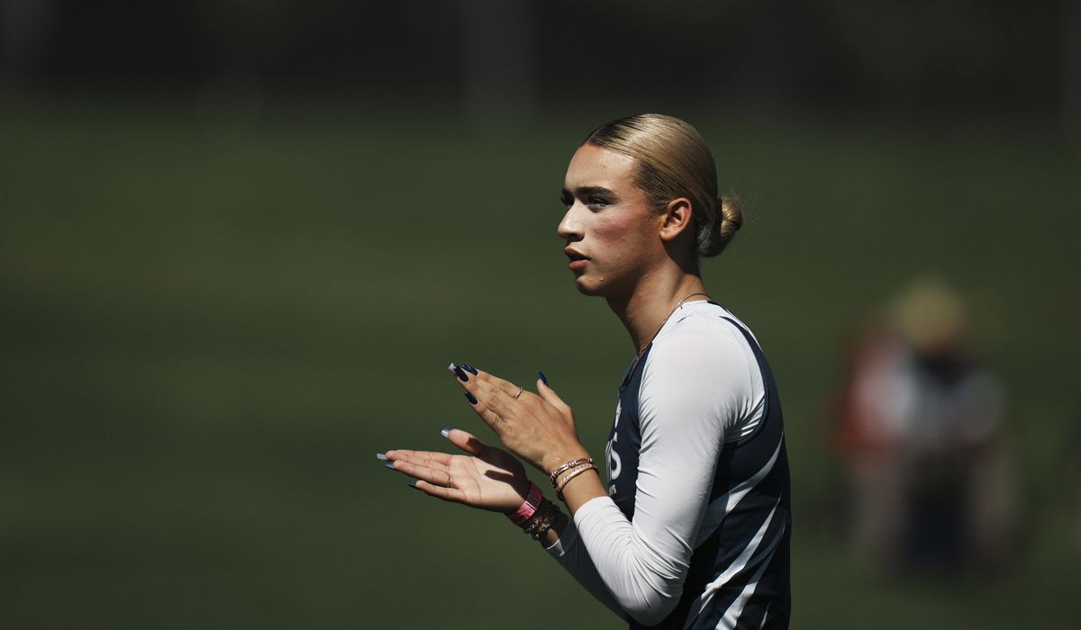 NextImg:Male-born athlete reaches California girls’ track finals; LGBTQ activist arrested outside event