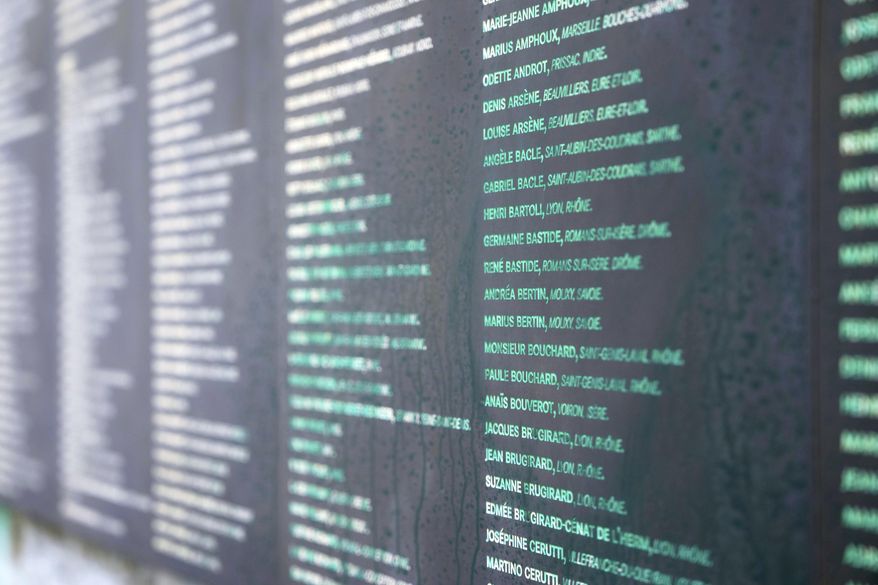 Paris' Shoah Memorial is defaced with green paint after several Jewish sites across the capital were defaced with green paint. Saturday, May 31, 2025 in Paris. (AP Photo/Aurelien Morissard)