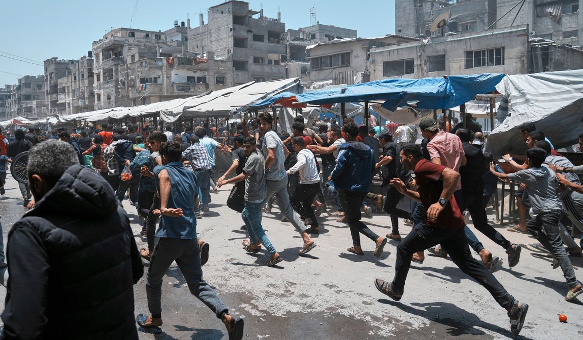 NextImg:At least 31 Palestinians are killed while heading to a Gaza aid hub, officials and witnesses say