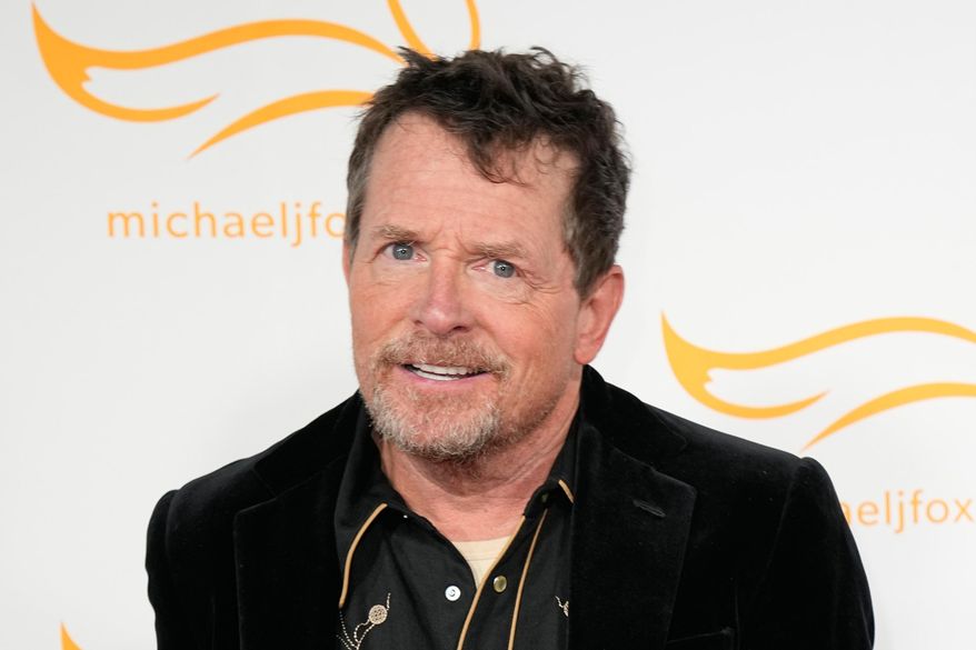 Michael J. Fox arrives at A Country Thing Happened On The Way To Cure Parkinson's in Nashville, Tenn., on April 26, 2023. (AP Photo/George Walker IV, File)