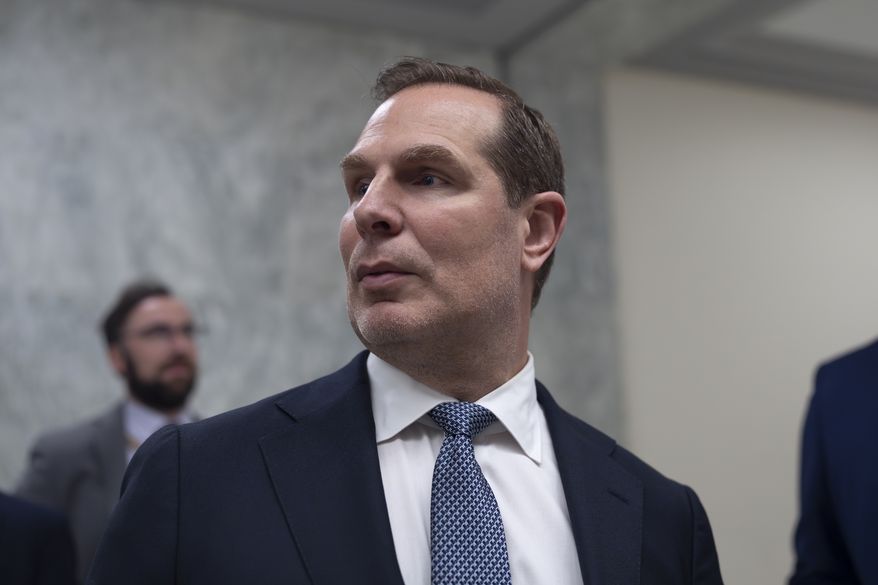 Pete Marocco, a political appointee focused on gutting USAID, departs after briefing the House Foreign Affairs Committee behind closed doors, on Capitol Hill in Washington, Wednesday, March 5, 2025. (AP Photo/J. Scott Applewhite)