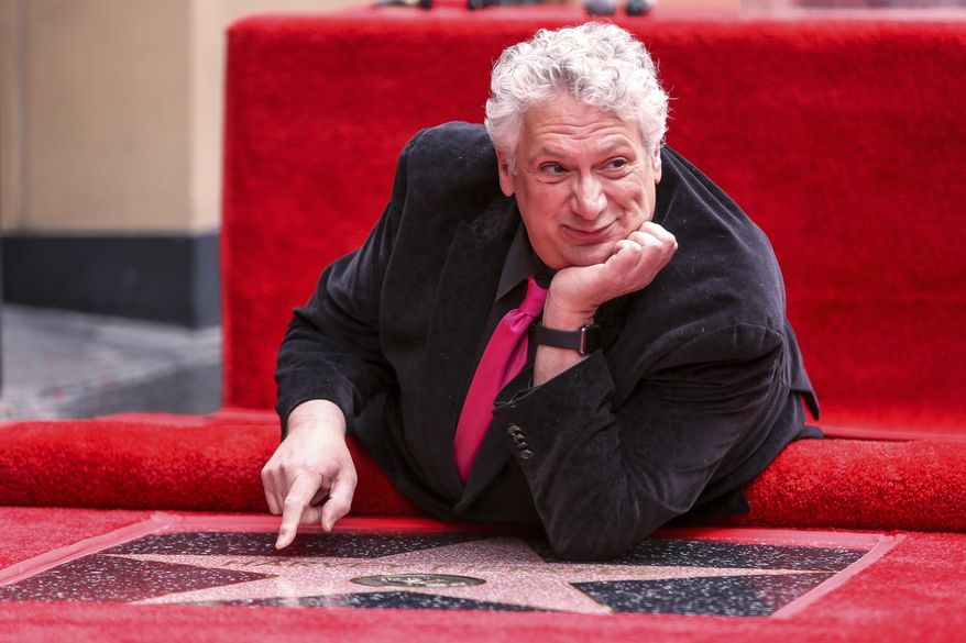FILE - Harvey Fierstein poses with his star at a ceremony on the Hollywood Walk of Fame on April 11, 2016, in Los Angeles.(Photo by Rich Fury/Invision/AP, File)