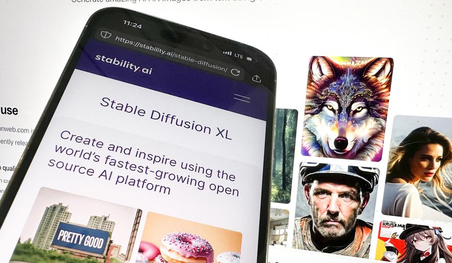 FILE - The desktop and mobile websites for Stable Diffusion are pictured, Oct. 24, 2023, in New York. (AP Photo/John Minchillo, File)