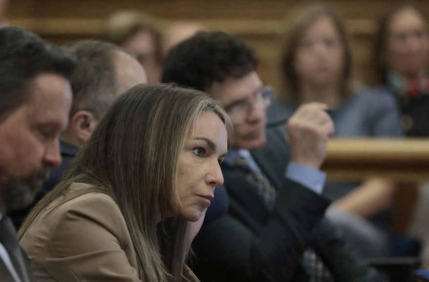 Dedham, MA June 9 Karen Read listens to the testimony of expert Daniel Wolfe, when he returns to the stand in her murder retrial in Norfolk Superior Court, Monday June 9, 2025, in Dedham, Mass. (Pat Greenhouse/The Boston Globe via AP, Pool)