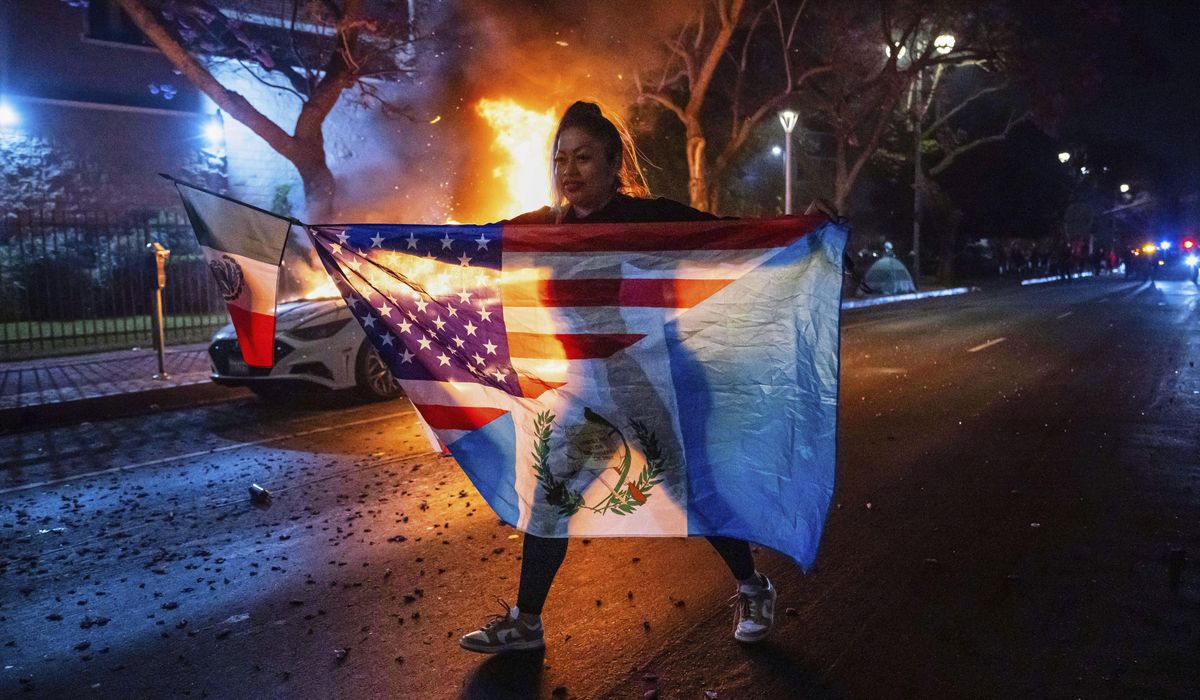 NextImg:Trump said he will invoke Insurrection Act if necessary