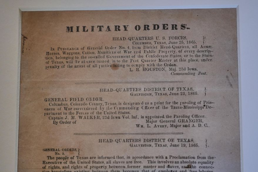 A view of a section of the 1865 Juneteenth General Order No. 3 that is displayed by the Dallas Historical Society at the Fair Park Hall of State in Dallas, Friday, June 6, 2025. (AP Photo/LM Otero)