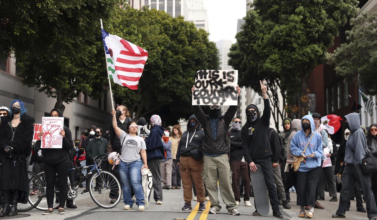 NextImg:Protests over immigration raids pop up across the U.S. with more planned