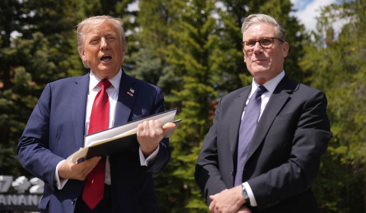 NextImg:Trump, Starmer use G7 summit to finalize trade deal announced in May