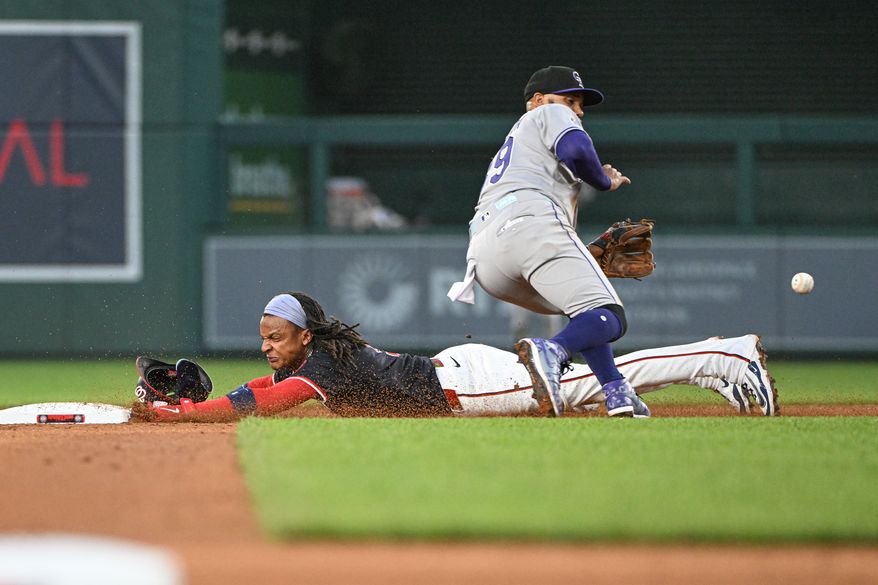 Washington Nationals shortstop C.J. Abrams (5) diving into second base with a stolen base during the fourth inning of an MLB game against the Colorado Rockies at Nationals Park in Washington D.C., June 16, 2025. (Photo by All-Pro Reels for Washington Times Sports)