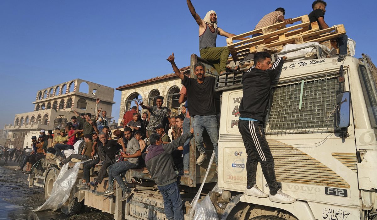 NextImg:Palestinians say at least 51 killed while waiting for aid trucks