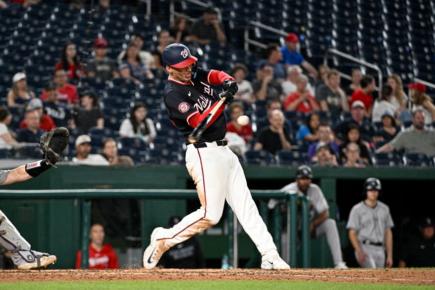 Washington Nationals third baseman Brady House (55) hitting an RBI single during the ninth inning of an MLB game against the Colorado Rockies at Nationals Park in Washington D.C., June 17, 2025. (Photo by All-Pro Reels for Washington Times Sports)