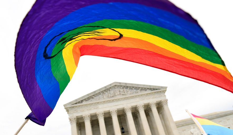 FILE - People gather outside the Supreme Court in Washington, Oct. 8, 2019. (AP Photo/Susan Walsh, File)
