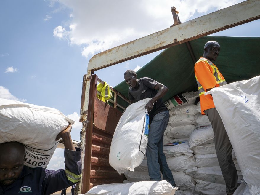 A Fogbow aid plane is loaded at an airport in Juba, South Sudan, on Monday, June 9, 2025, before conducting airdrops of food in the Upper Nile region. (AP Photo/ Florence Mettiaux)