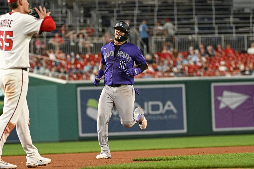 Colorado Rockies third baseman Orlando Arcia (11) headed to third after hitting a triple during the seventh inning of an MLB game against the Washington Nationals at Nationals Park in Washington D.C., June 18, 2025. (Photo by All-Pro Reels for Washington Times Sports)
