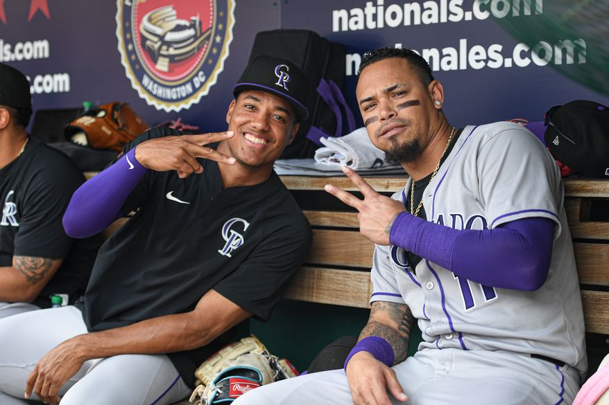 Colorado Rockies relief pitcher Juan Mejia (47) and second baseman Orlando Arcia (11) on the bench before the start of an MLB game against the Washington Nationals at Nationals Park in Washington D.C., June 19, 2025. (Photo by All-Pro Reels for Washington Times Sports)