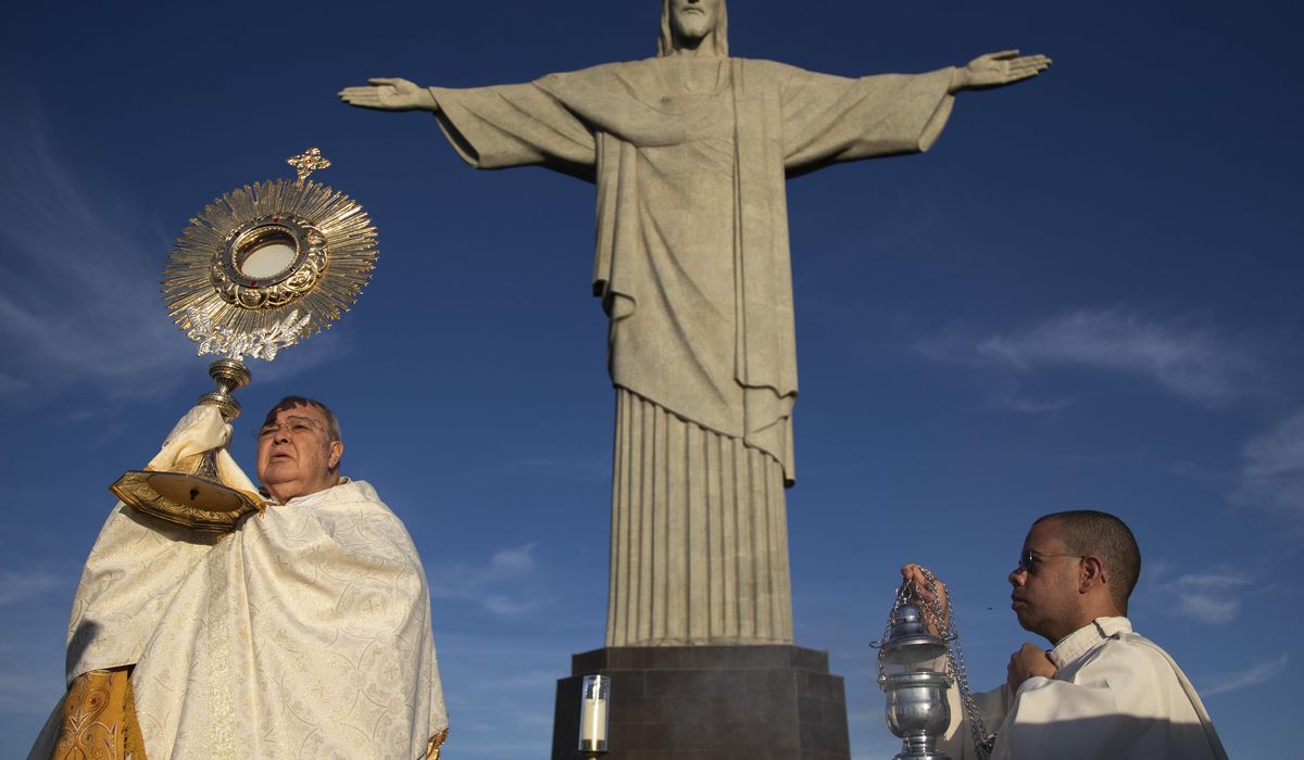 NextImg:Catholics call for environmental action at Rio de Janeiro’s iconic Christ the Redeemer statue