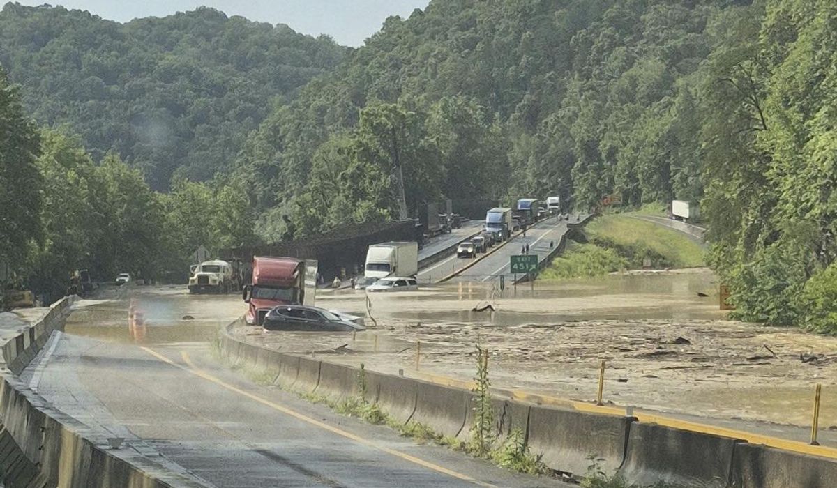 NextImg:Flooding and rock slides close heavily damaged I-40 section in Smoky Mountains