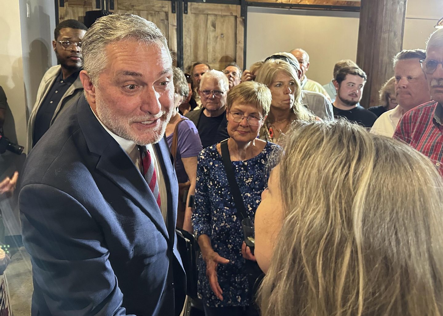 John Reid puts an AI twist on empty-chair debate routine in Virginia's lieutenant governor race