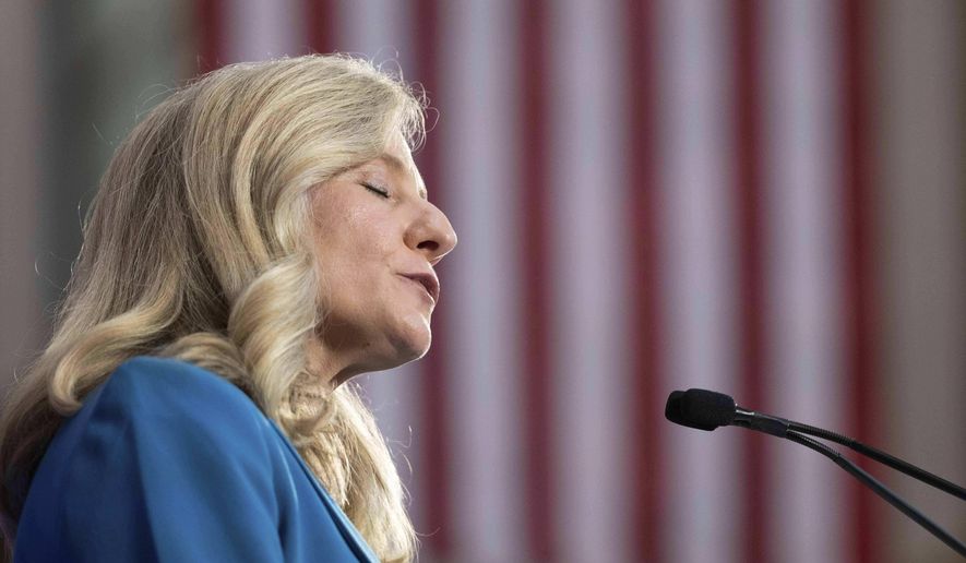 Democratic gubernatorial candidate Abigail Spanberger addresses a crowd at a rally at her alma mater, J.R. Tucker High School, in Henrico, Va., Monday, June 16, 2025. (Mike Kropf /Richmond Times-Dispatch via AP)