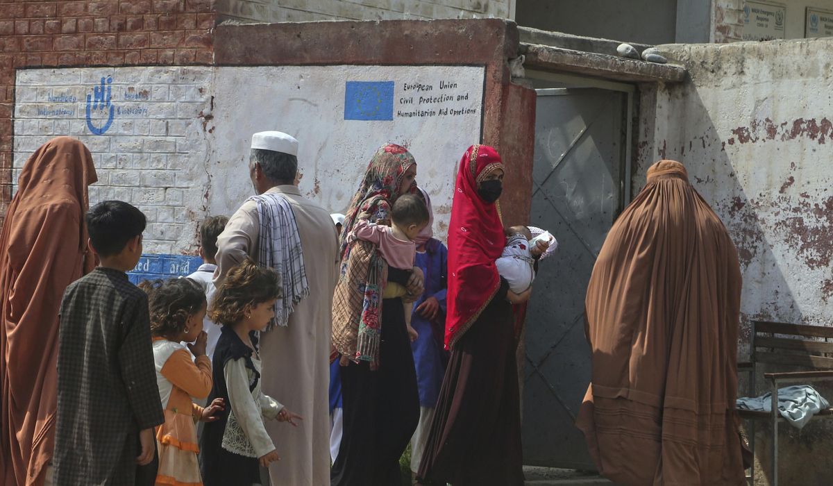 NextImg:Thousands of Afghans are fleeing Iran every day to escape war and deportation