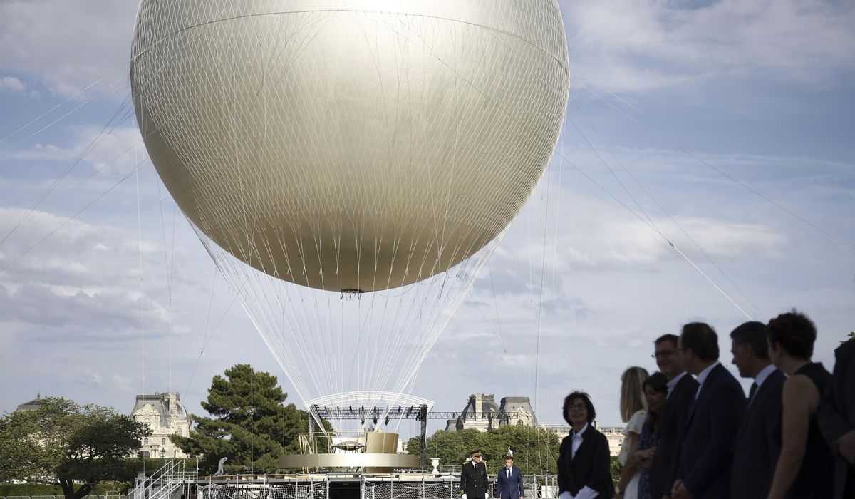 NextImg:Paris’ iconic cauldron from the Olympic Games returns to light up summer nights