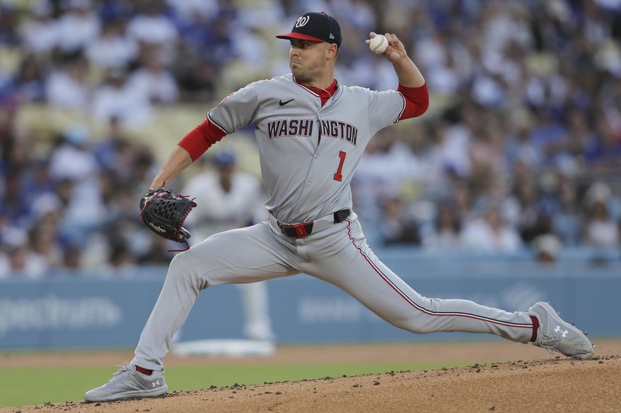 Washington Nationals pitcher MacKenzie Gore delivers to a Los Angeles Dodgers batter during the first inning of a baseball game in Los Angeles, Friday, June 20, 2025. (AP Photo/Jessie Alcheh)