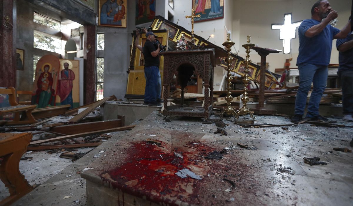 NextImg:Suicide bomber kills at least 13 in Syrian church near Damascus during Mass