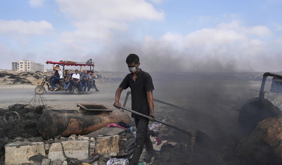 NextImg:Turning plastic into fuel: Photos of Gaza’s youth surviving with makeshift burners