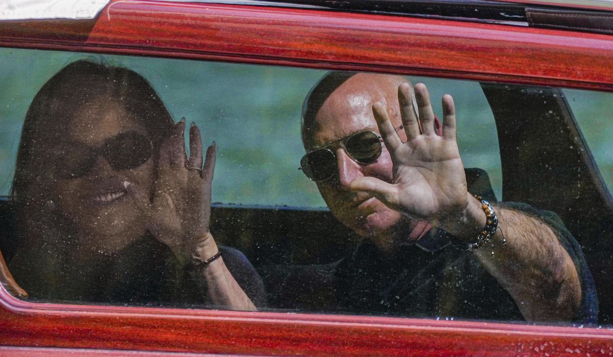 NextImg:Bezos arrives in Venice as protesters say his star-studded wedding highlights growing inequality