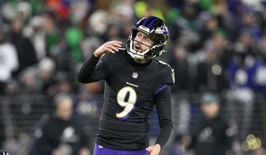 Baltimore Ravens kicker Justin Tucker watches his kick during the second half of an NFL football game against the Philadelphia Eagles, Dec. 1, 2024, in Baltimore. (AP Photo/Nick Wass, File)