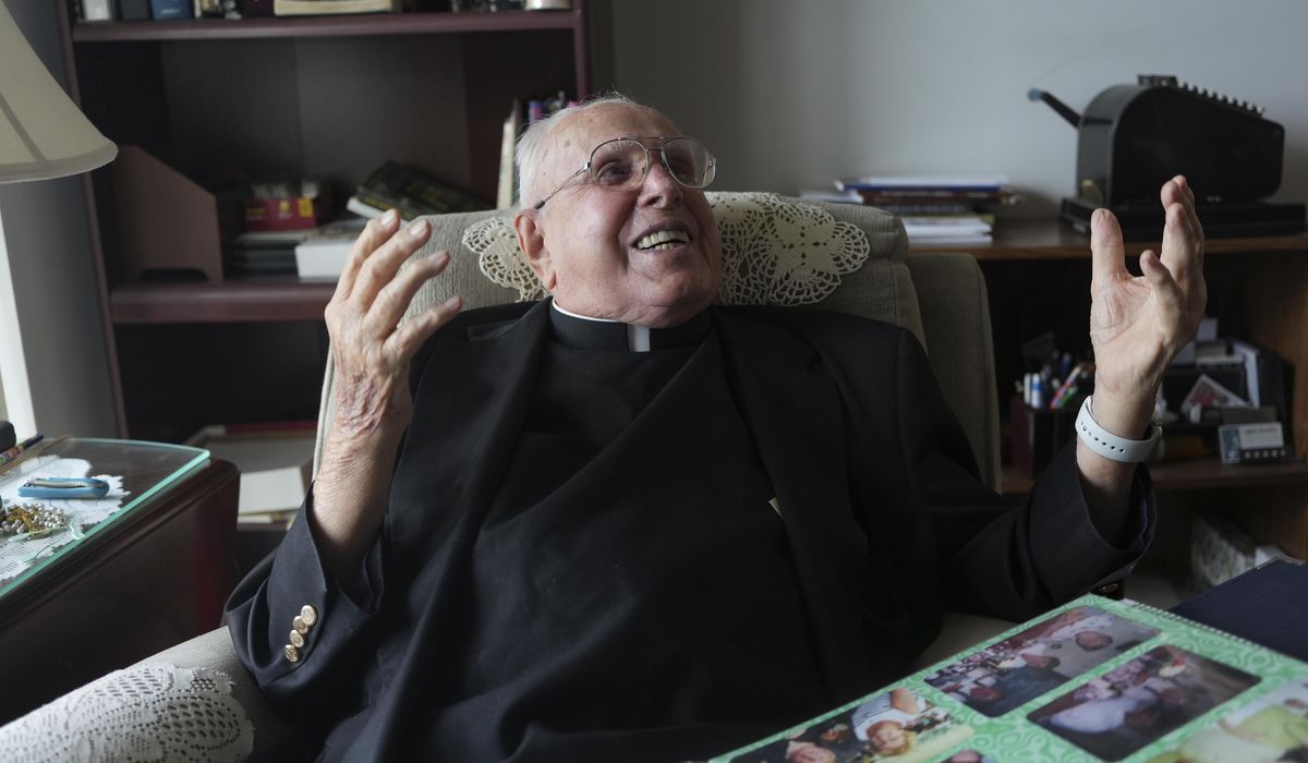 NextImg:At 100, this globetrotting Catholic priest still bakes pies, enjoys opera and performs daily Mass