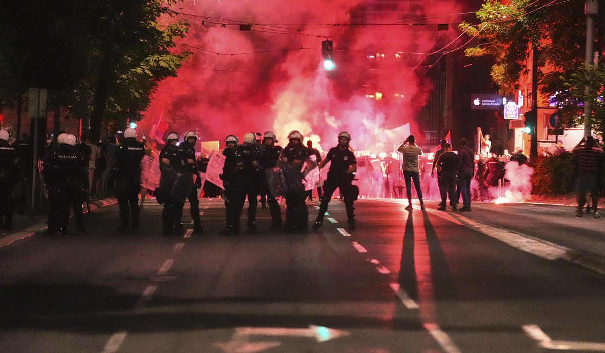 NextImg:Serbian riot police fire tear gas at anti-government protesters demanding an early election