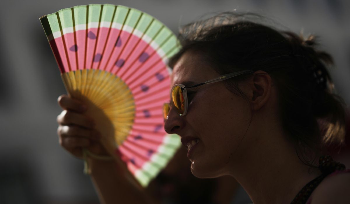NextImg:Severe heat waves hit Southern Europe as local authorities warn against wildfire risks