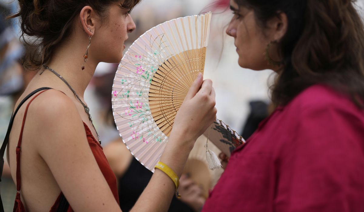 NextImg:Severe heat waves hit Southern Europe as local authorities warn against wildfire risks