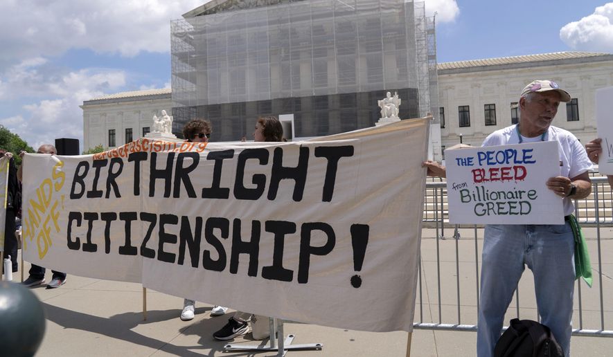Demonstrators holds up a banner during a citizenship rally outside of the Supreme Court in Washington, May 15, 2025. (AP Photo/Jose Luis Magana) **FILE**
