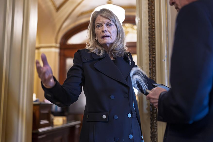 Sen. Lisa Murkowski, R-Alaska, a member of the Senate Appropriations Committee, pauses outside the chamber to answer a question from a reporter at the U.S. Capitol in Washington, March 14, 2025. (AP Photo/J. Scott Applewhite, File)
